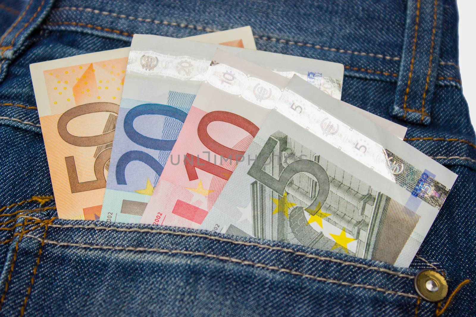 Euro notes in jeans pocket by BenSchonewille