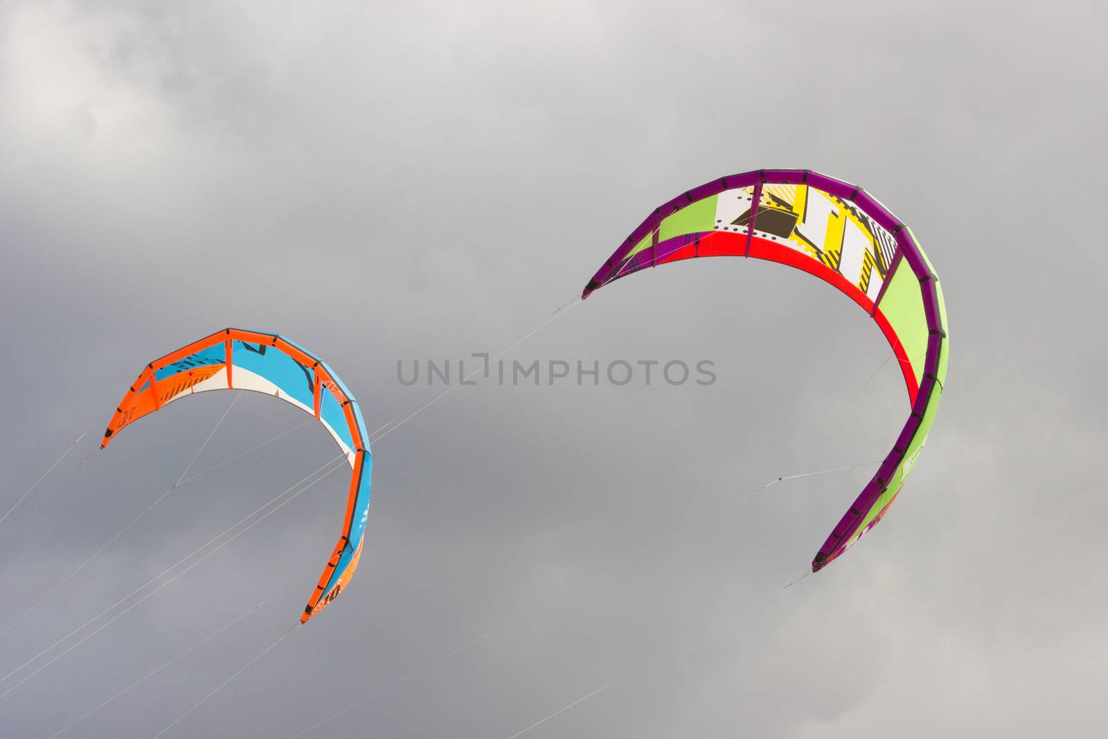 Close up of two colorful kites in the sky