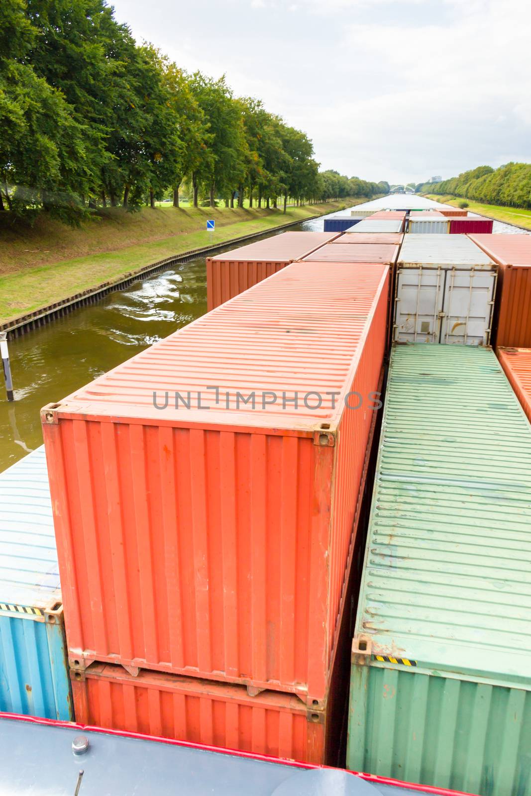 Metal Cargo containers on  ship in canal