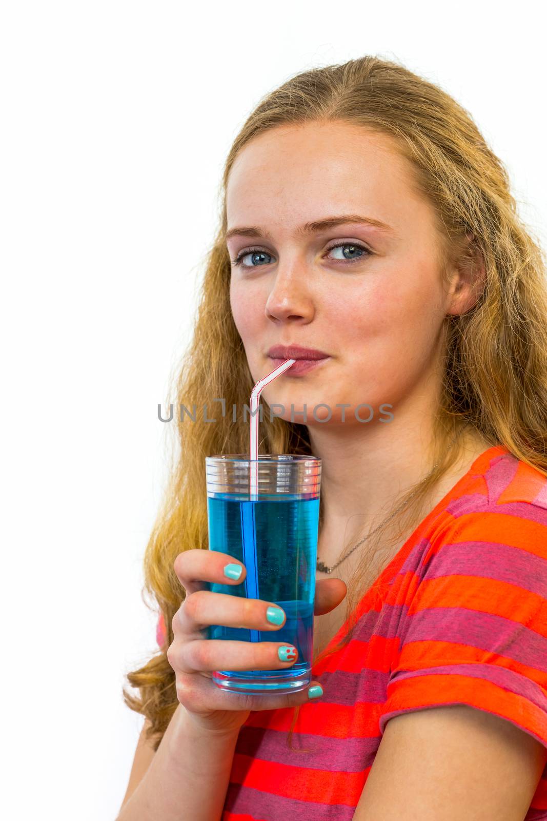 Dutch teenage girl drinking blue soft drink with straw isolated on white background
