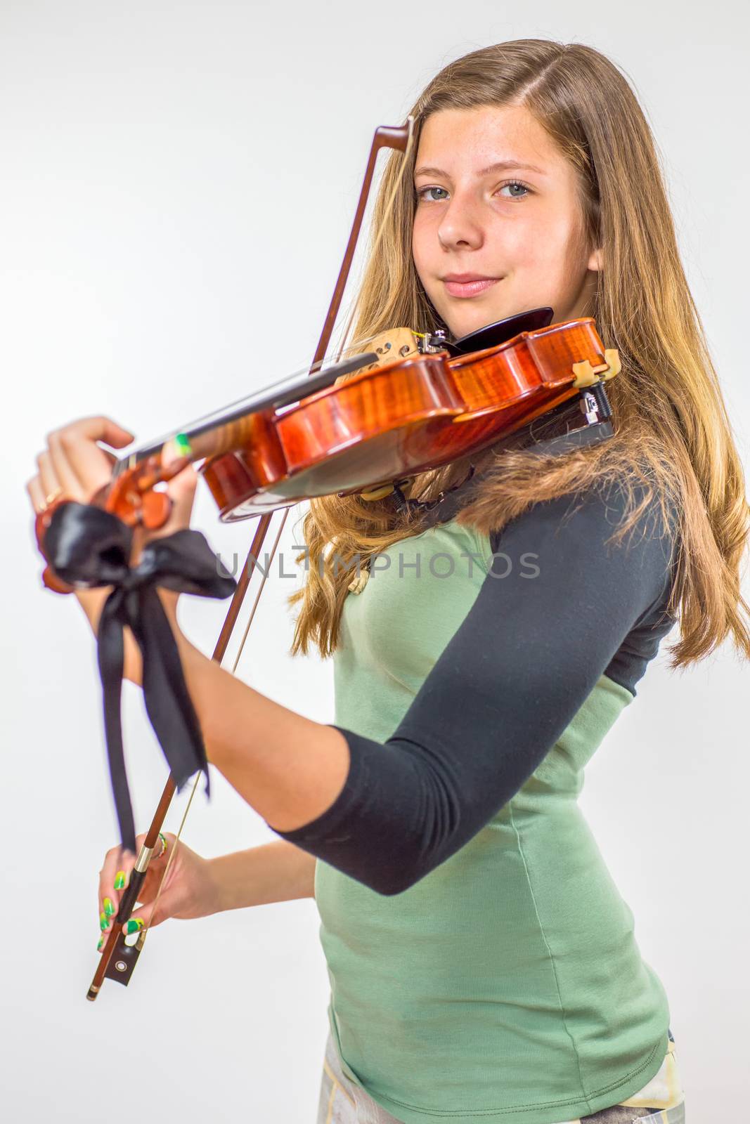 Dutch teenage girl playing violin by BenSchonewille