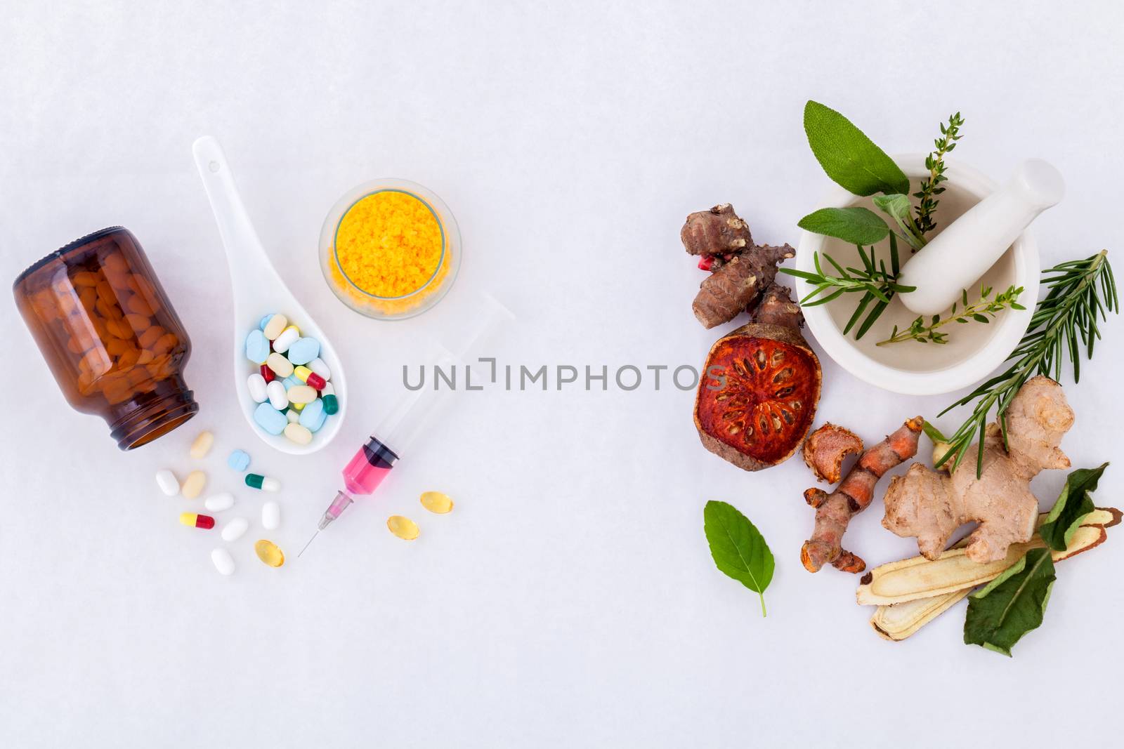 Herbal medicine VS Chemical medicine the alternative healthy care on white background.