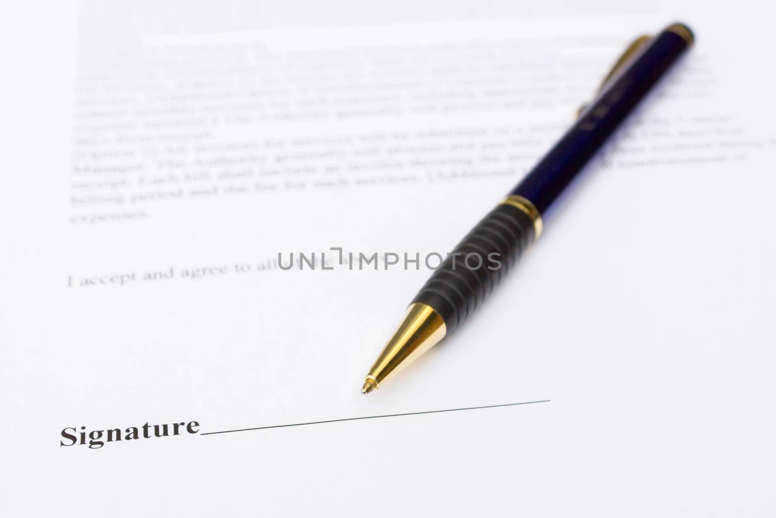 Pen for signature lying on contract by BenSchonewille