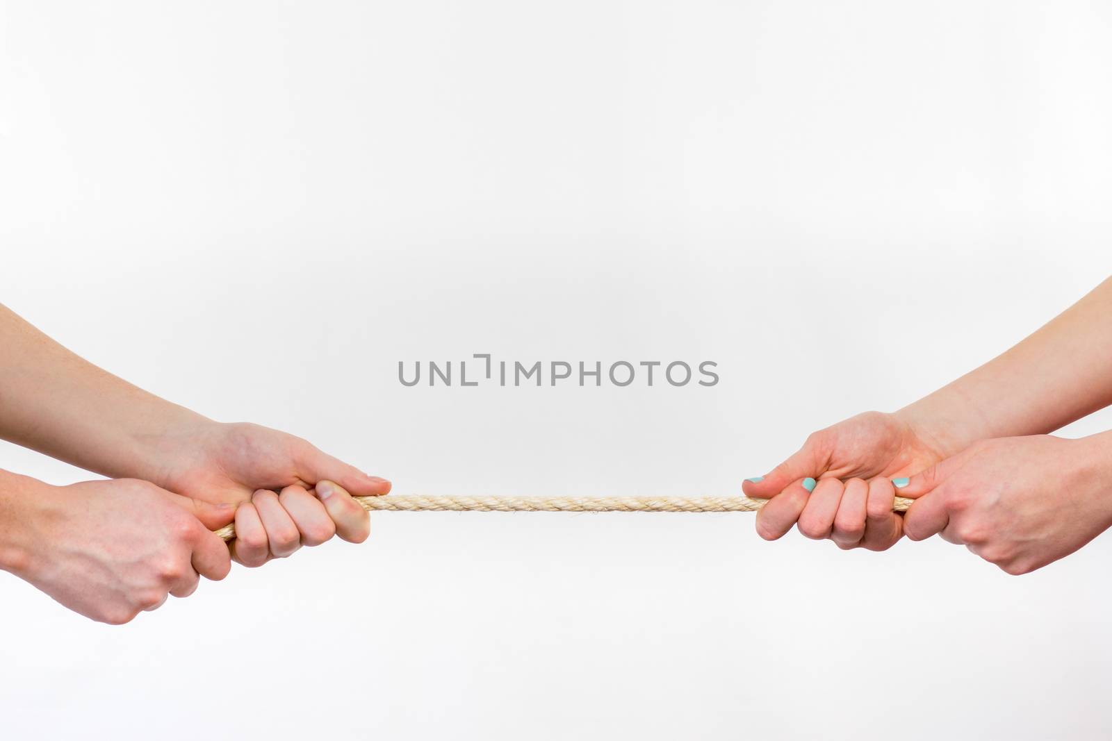 Two opposite persons pulling rope. Four arms isolated on white background