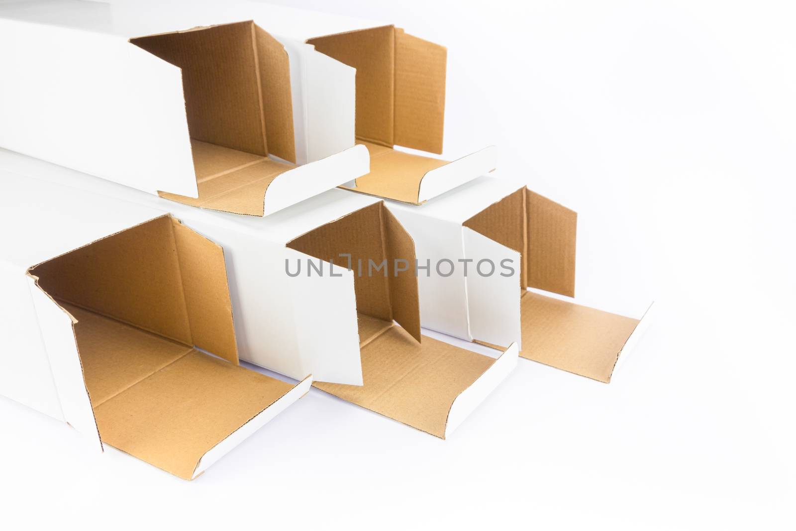 Several cartboard boxes as group together isolated on white background