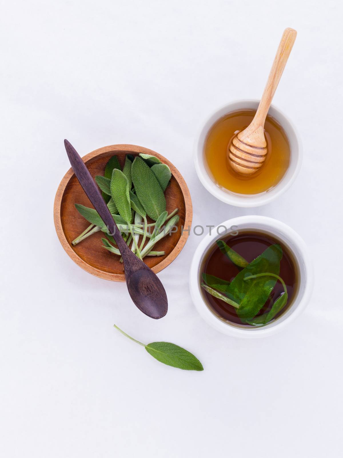 The cup of  sage healthy drinking tea for warm when illness and  by kerdkanno