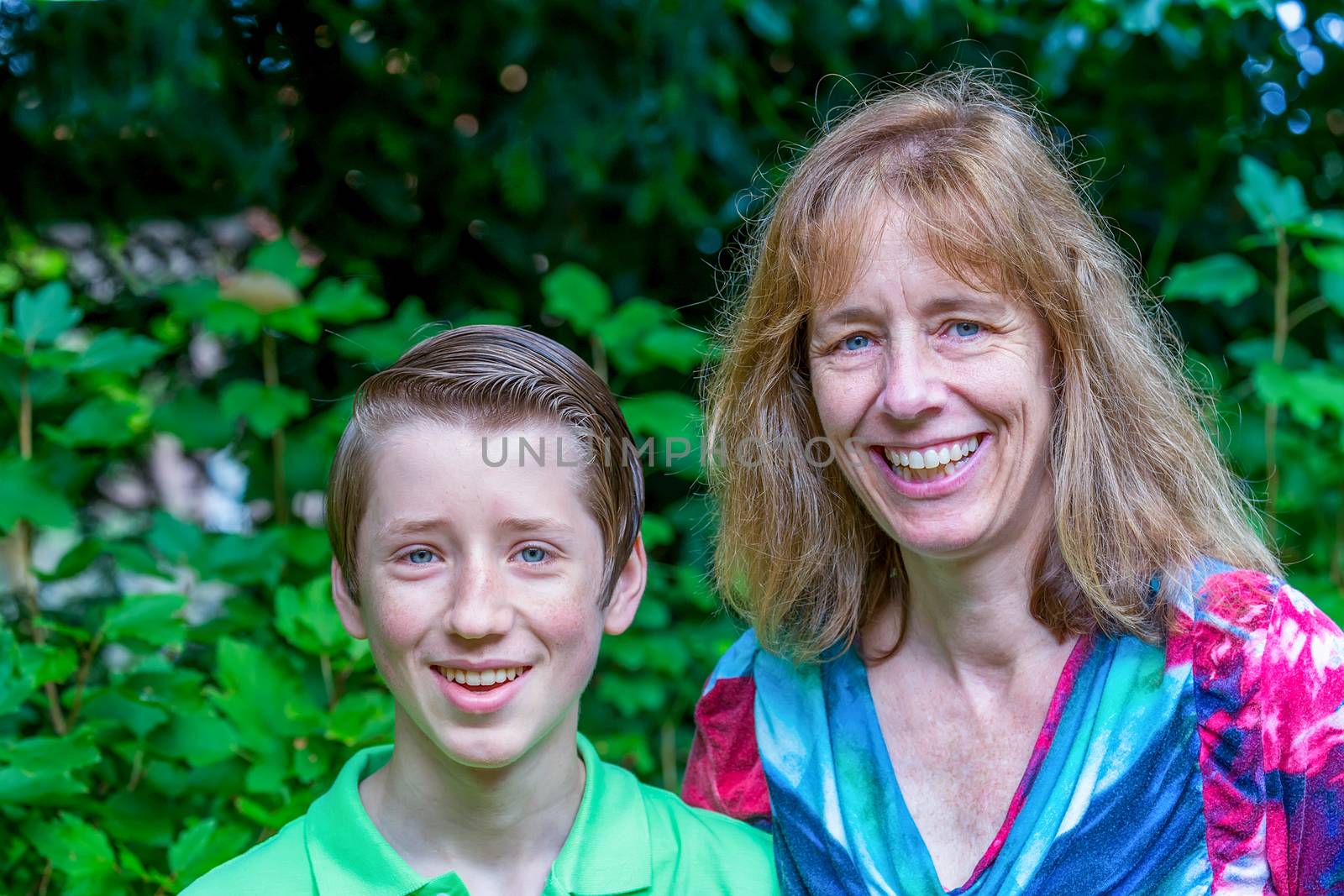 Portrait of dutch mother and son outdoors by BenSchonewille