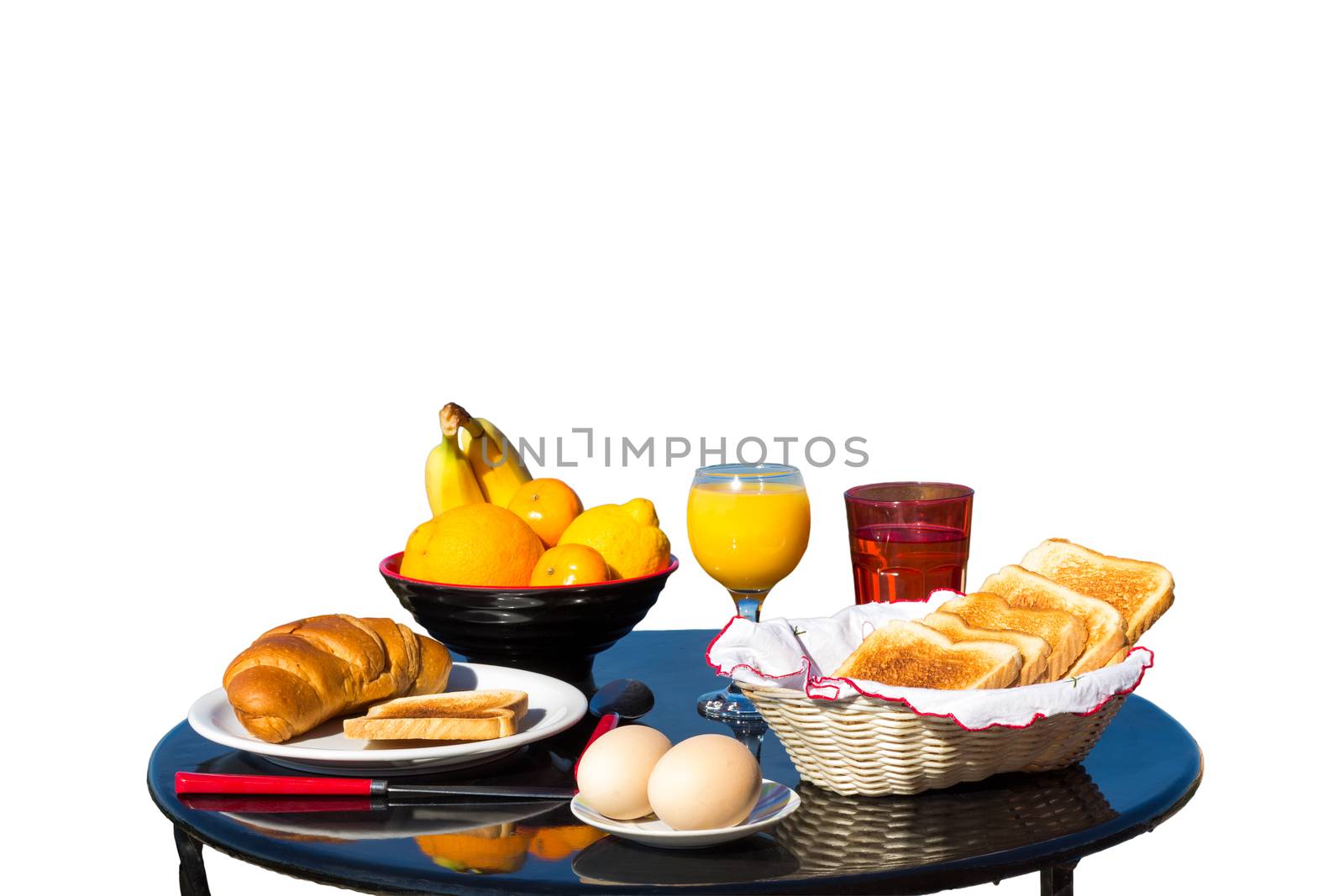 Table with food as breakfast isolated on white background