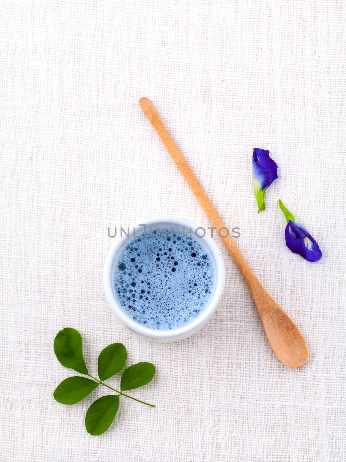 pigeon wing pea healthy drinking water on white table.