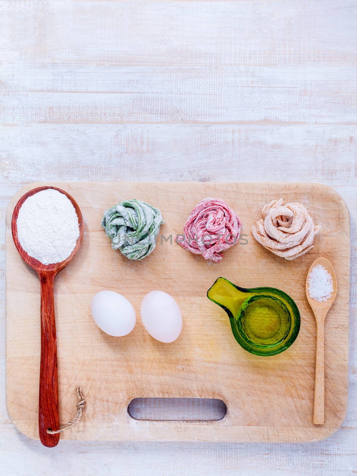 Preparation homemade pasta on wooden table.  by kerdkanno