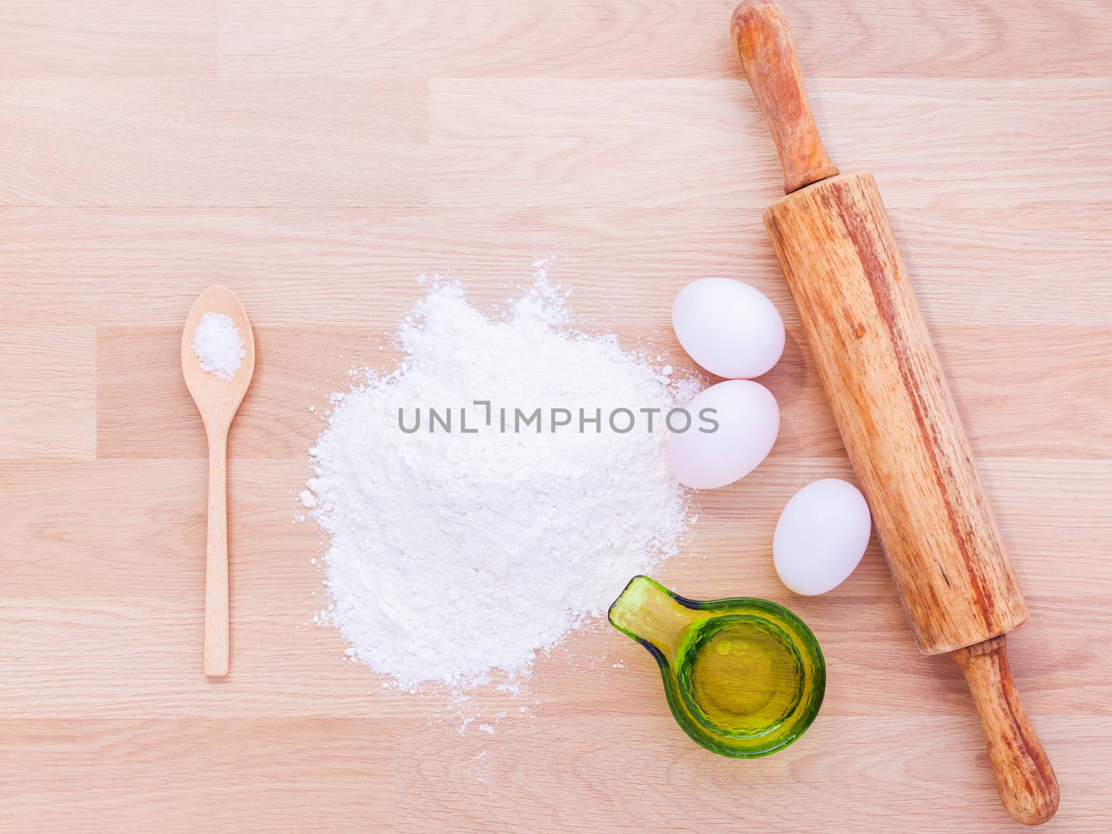 Preparation homemade pasta on wooden table. by kerdkanno