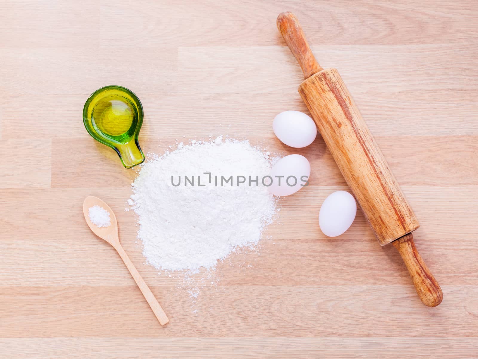 Preparation homemade pasta on wooden table. by kerdkanno