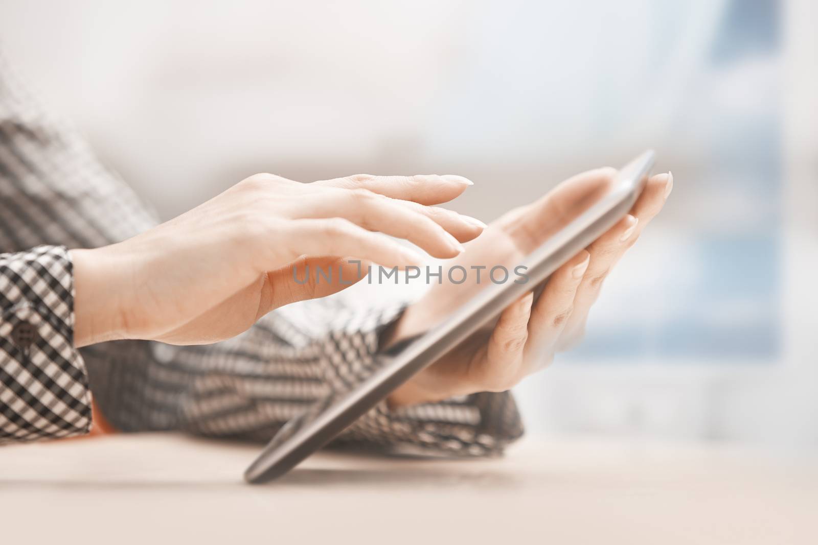 Businesswoman at office working with digital tablet