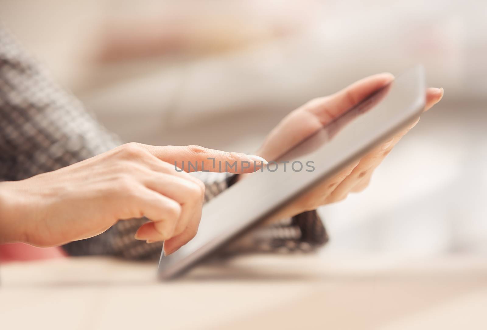 Businesswoman at office working with digital tablet