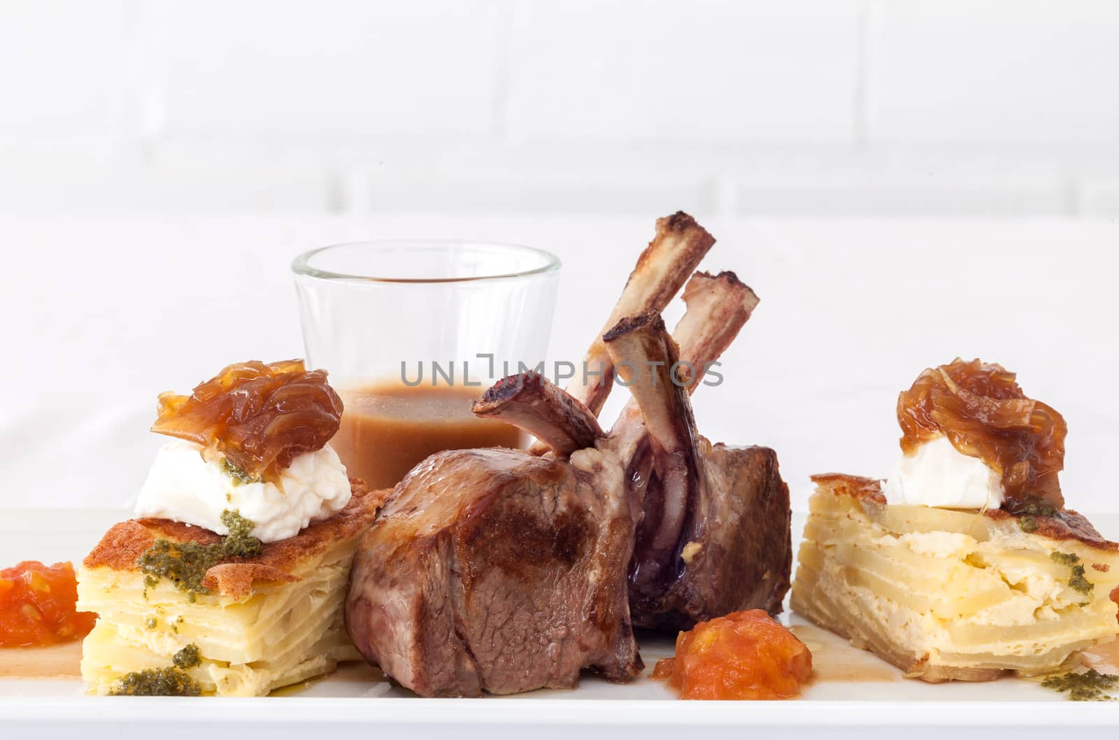 Roasted Lamb Chops on white background. by kerdkanno