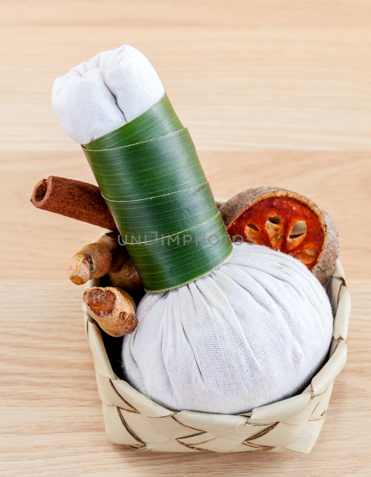 Spa and wellness treatment setup on wooden panel. by kerdkanno