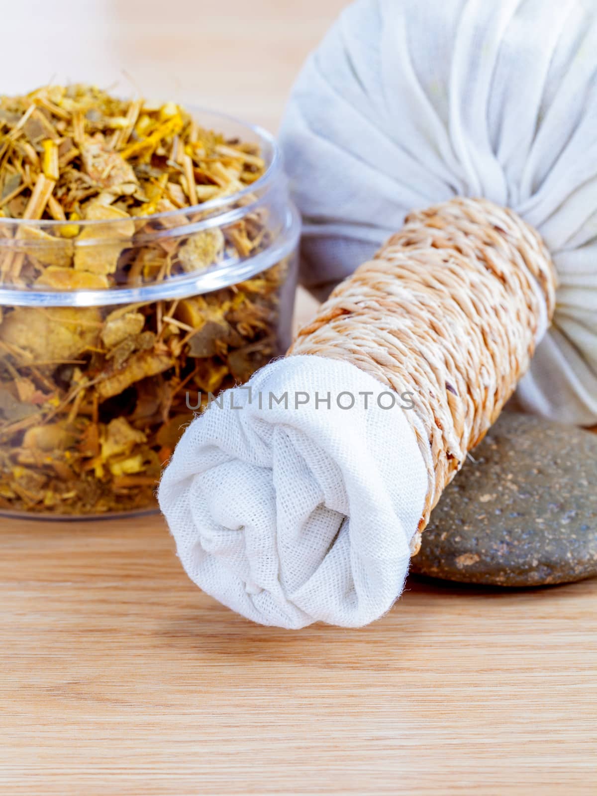 Natural Spa Ingredients . The herbal compress ball and massage oil for spa treatment.