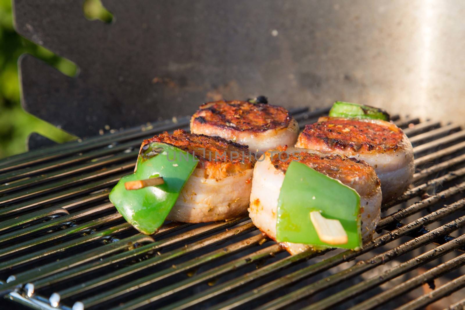 Grilled meat on a summer barbecue in the garden