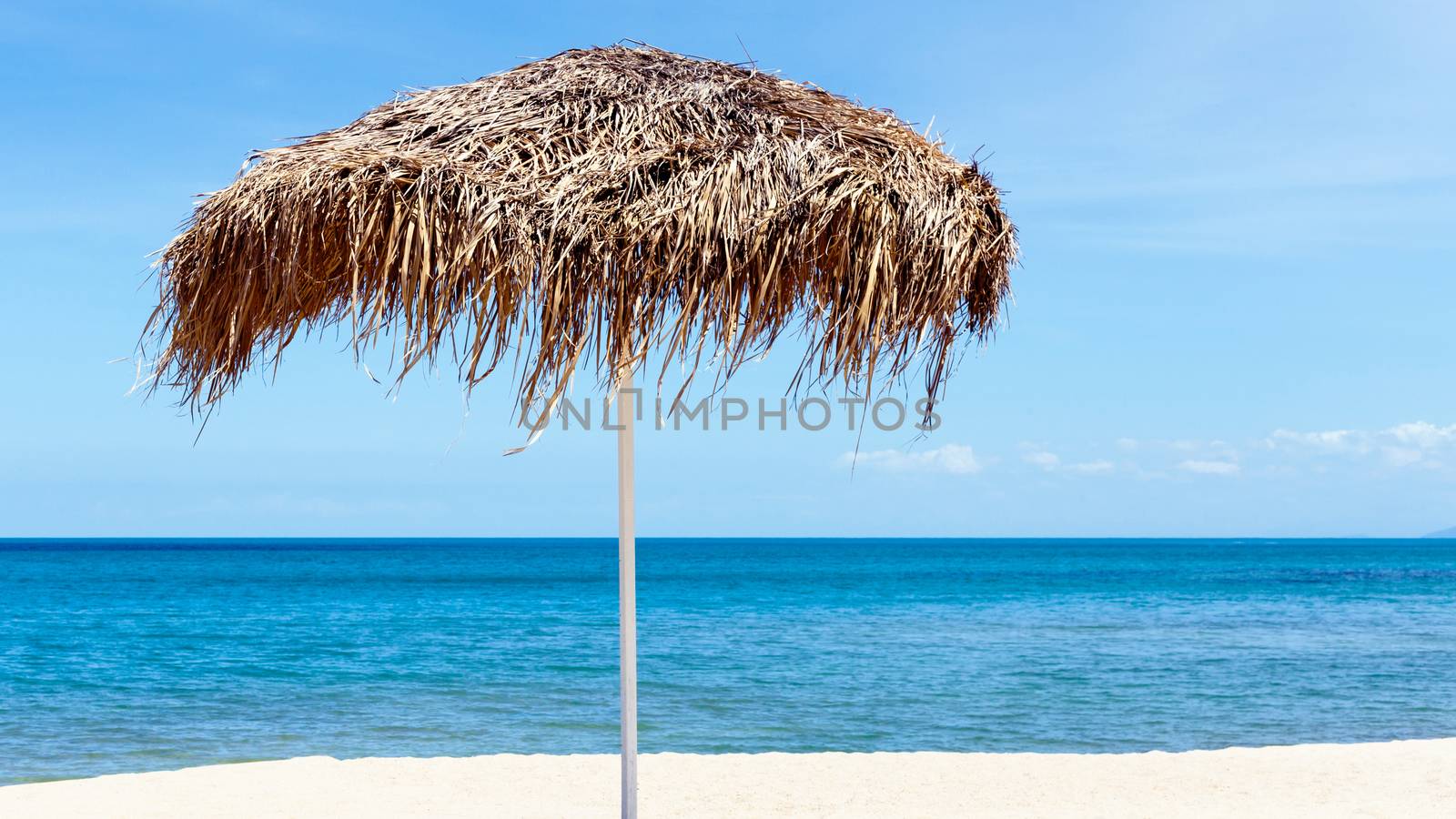 The beautiful straw umbrella at the beach. - at Koh Samui Thaila by kerdkanno