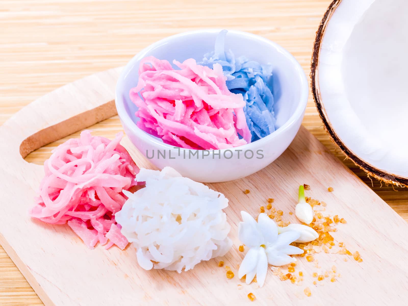 A colorful traditional coconut dessert made from grated coconut  by kerdkanno