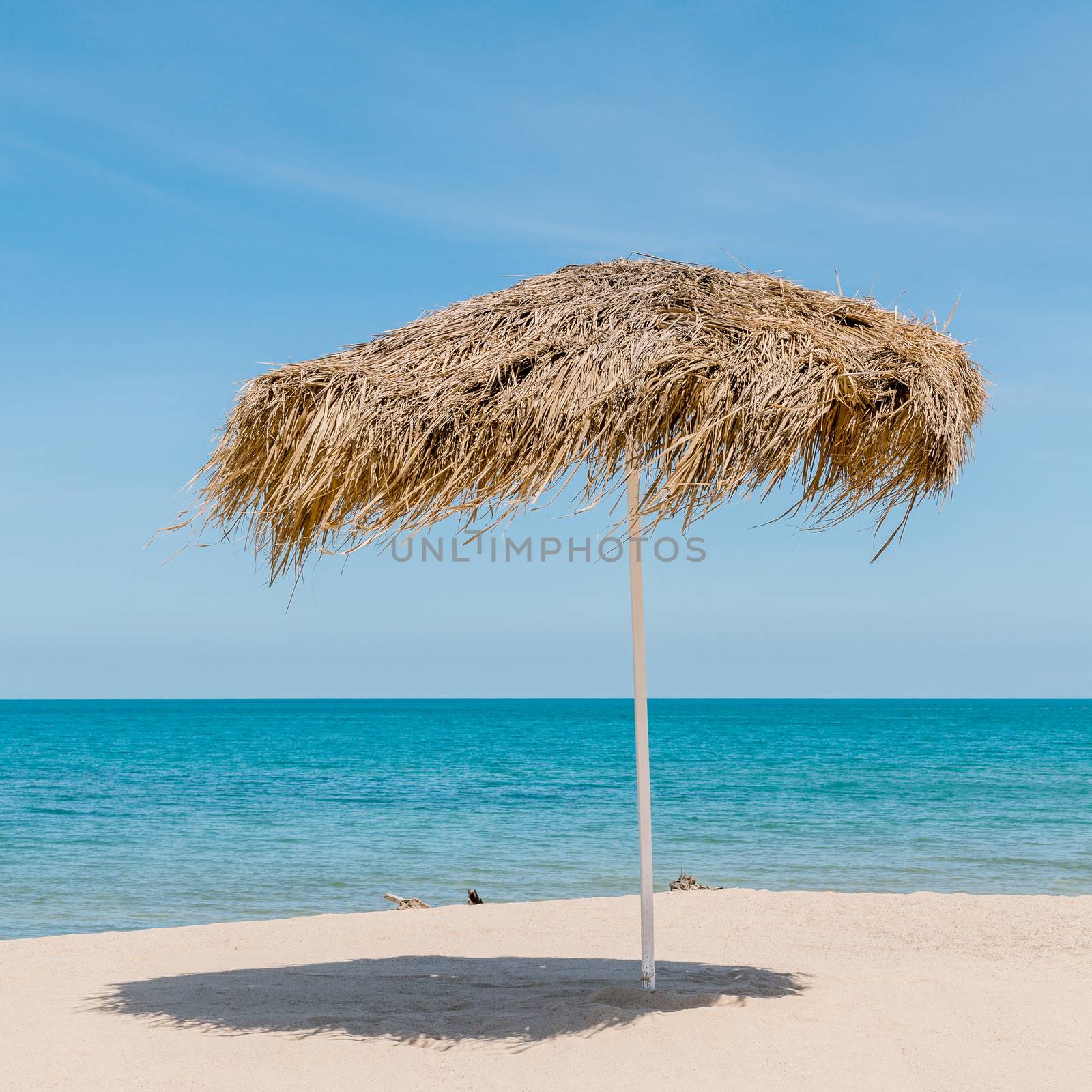 The beautiful straw umbrella at the beach. - at Koh Samui Thaila by kerdkanno