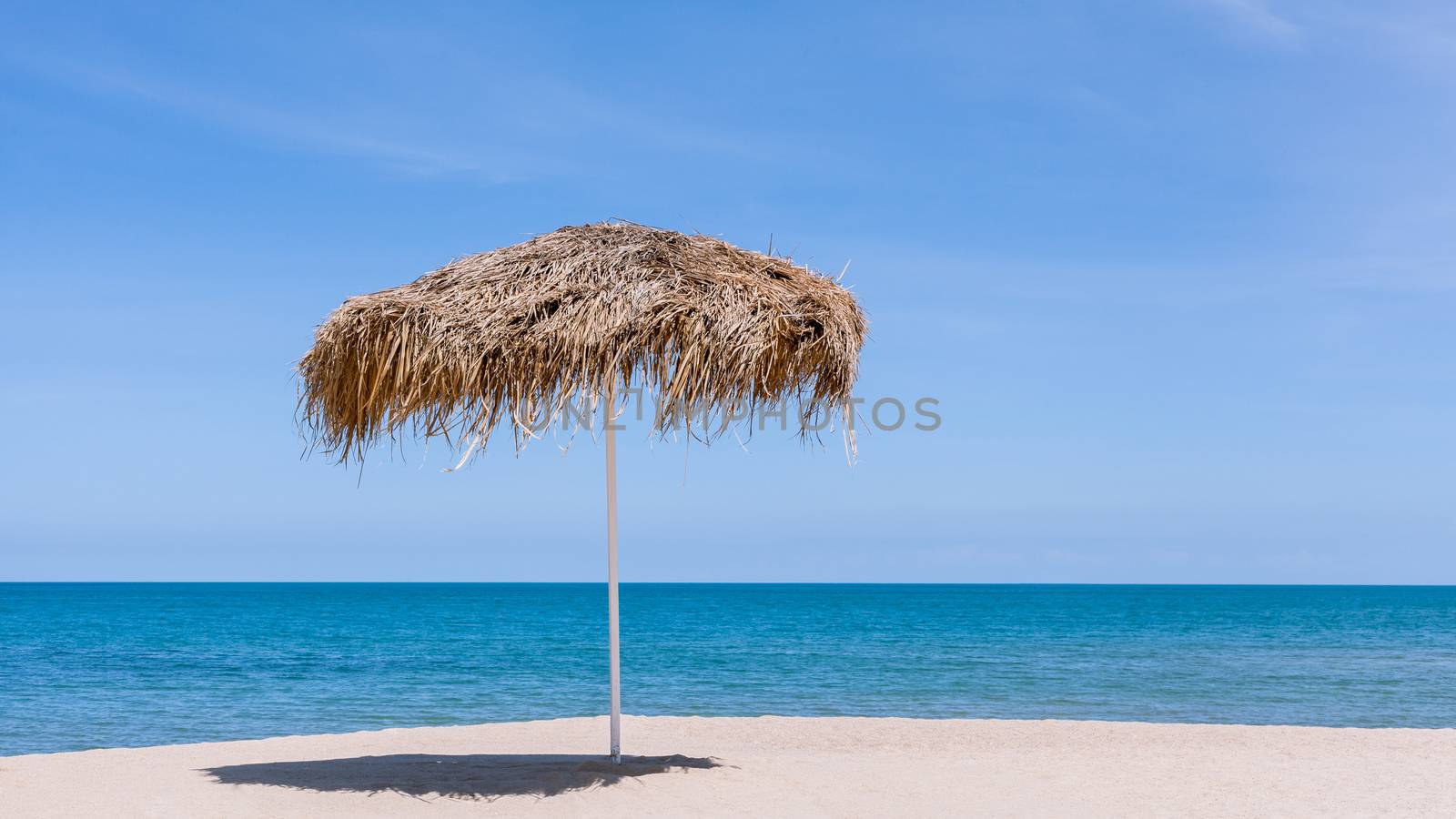 The beautiful straw umbrella at the beach. - at Koh Samui Thailand