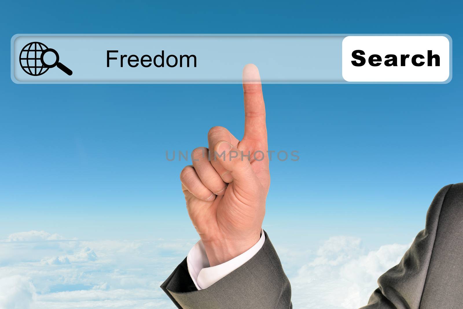 Businessmans hand on blue sky background with word freedom in browser 