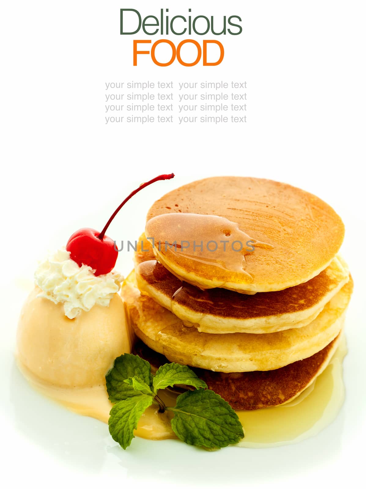 Stack of pancakes with syrup and ice cream.