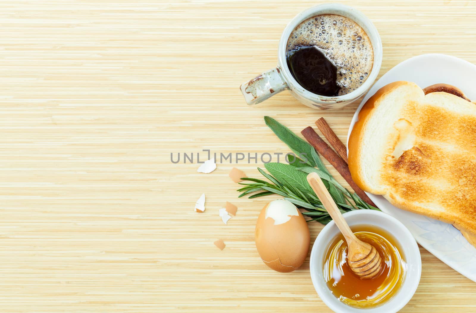 Healthy breakfast  toasts and herb on wooden table with copy space.