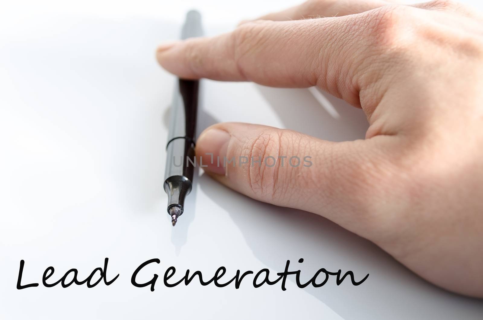 Pen in the hand isolated over white background and text concept