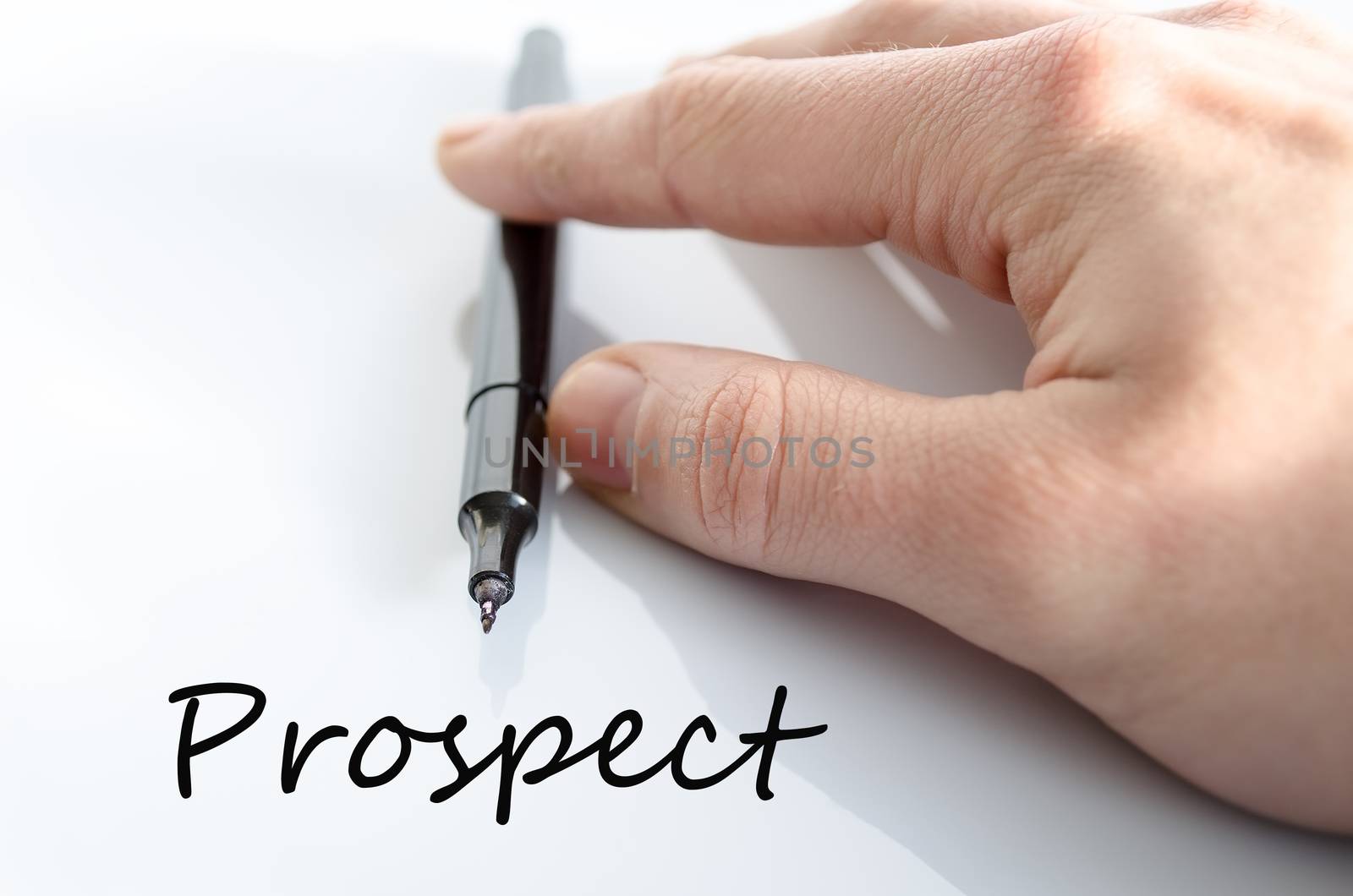 Pen in the hand isolated over white background and text concept