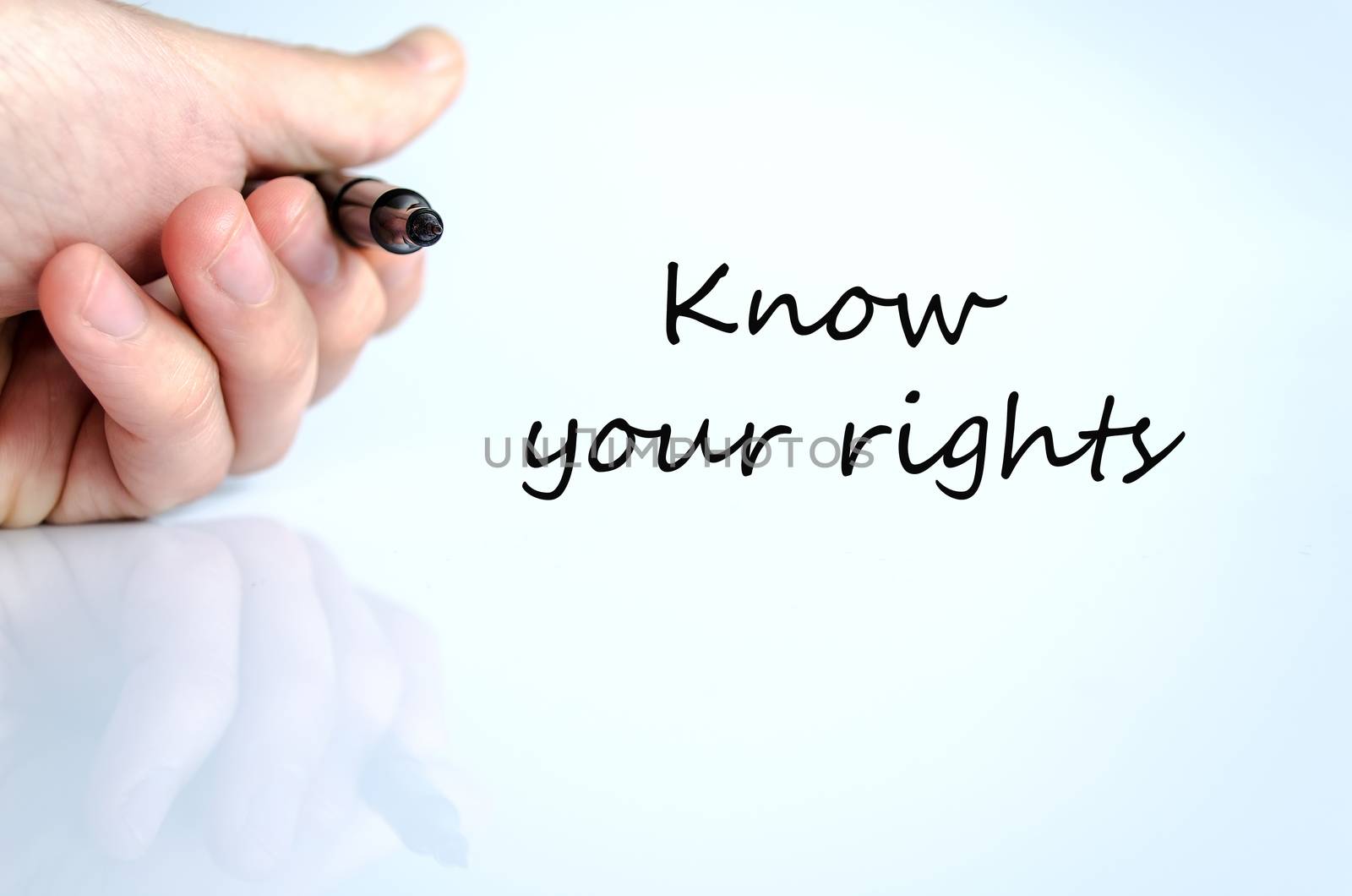 Pen in the hand isolated over white background and text concept