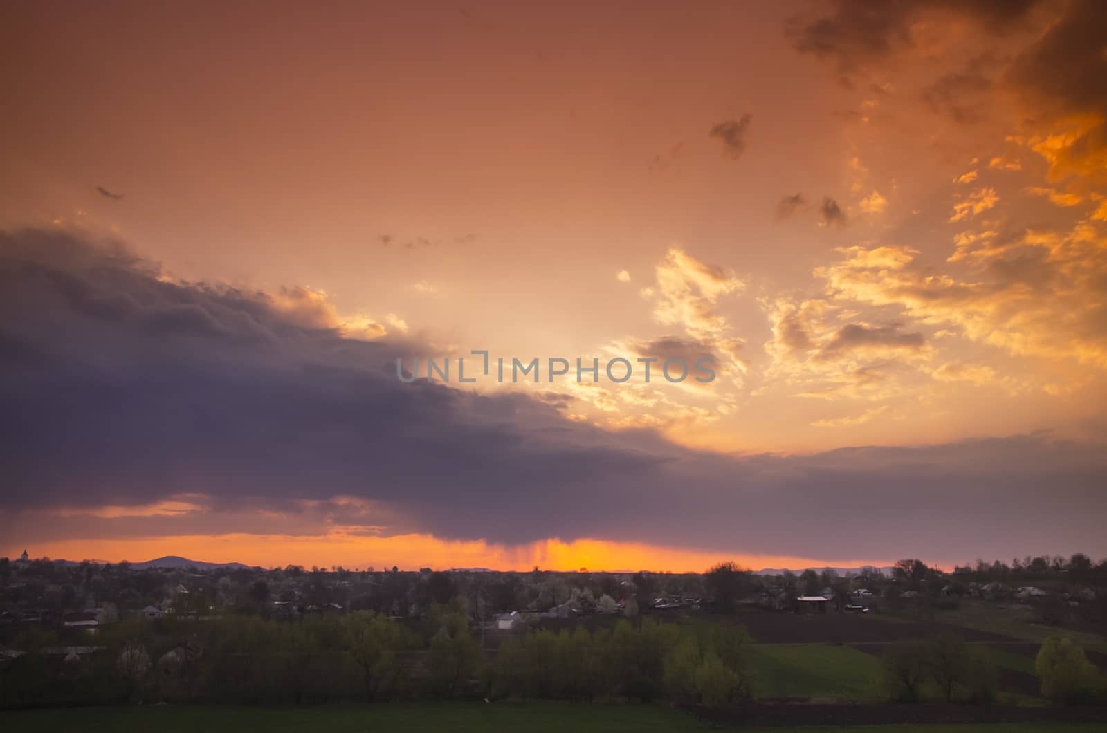 Orange sunset in a small village