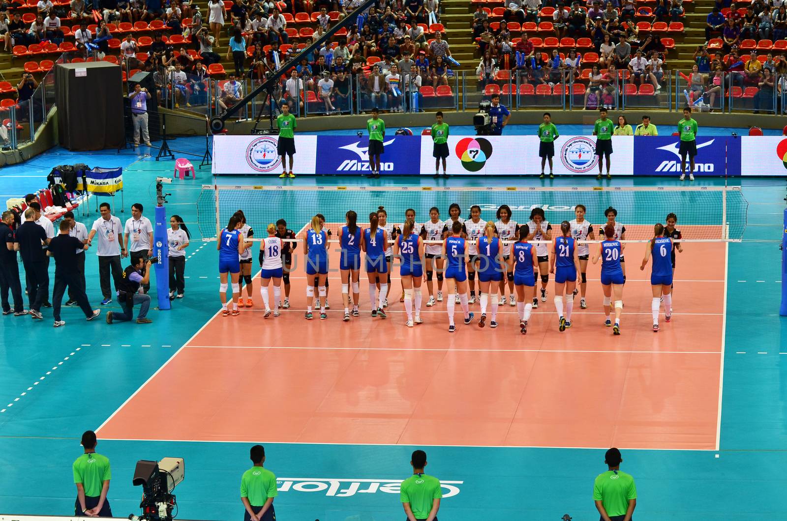 Bangkok, Thailand - July 3, 2015: Thailand and Serbia Volleyball Women Team in action during The FIVB Volleyball World Grand Prix at Indoor Stadium Huamark on July 3, 2015 in Bangkok, Thailand.