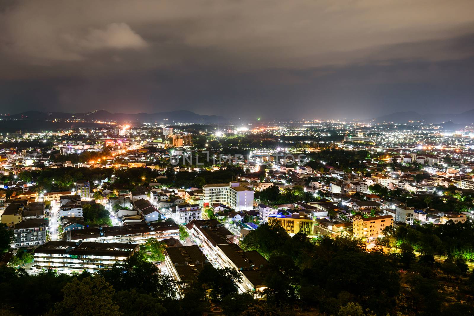 High angle view city at night sky from Khao Rang viewpoint is a tourist town near the sea on big island of Phuket province in Thailand