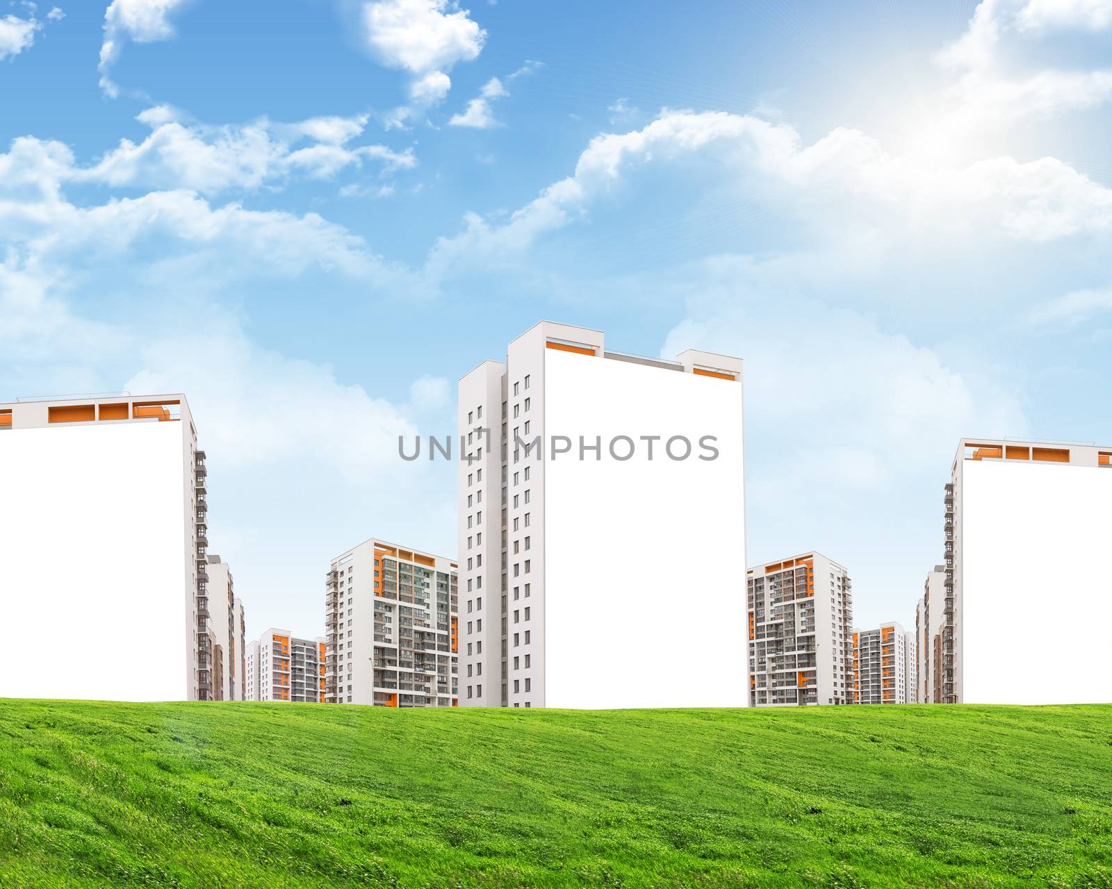Buildings with blank housefronts on nature background