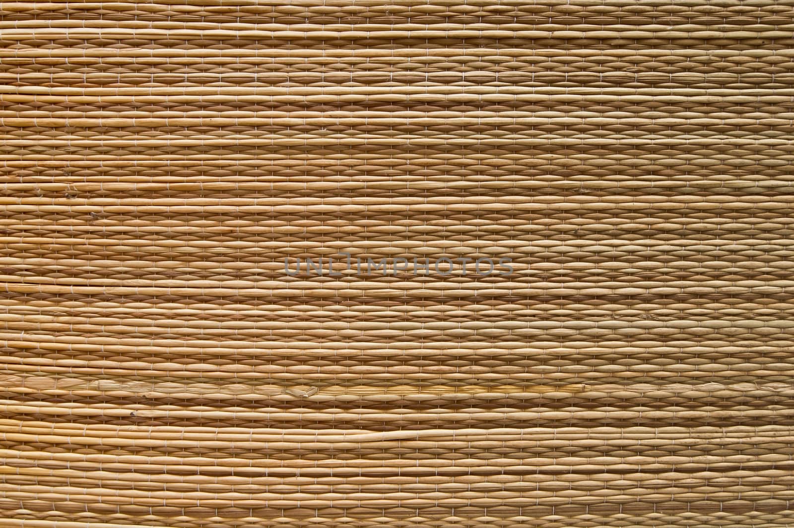 Thread woven mat hanging on the wall.
