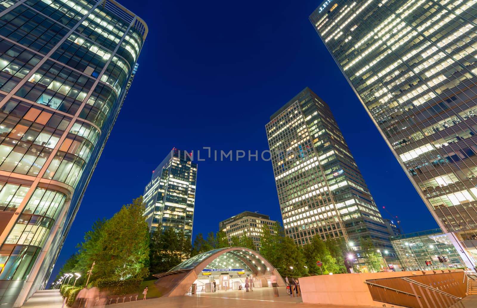 LONDON - JUNE 29, 2015: Canary Wharf skyscrapers at night. Canary Wharf is a financial city dictrict.
