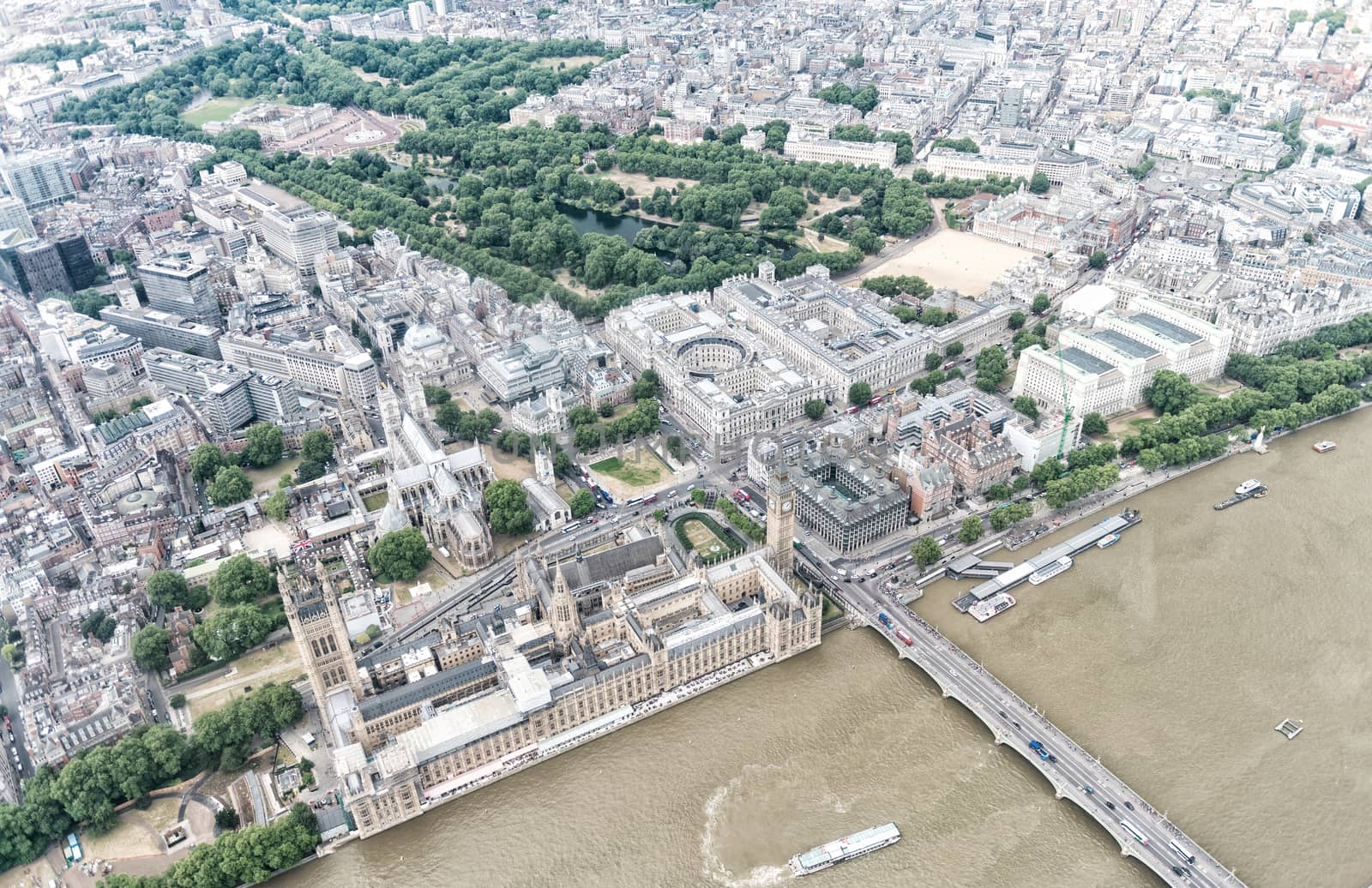 London. Helicopter view of Westminster Palace and Bridge on a beautiful summer day.