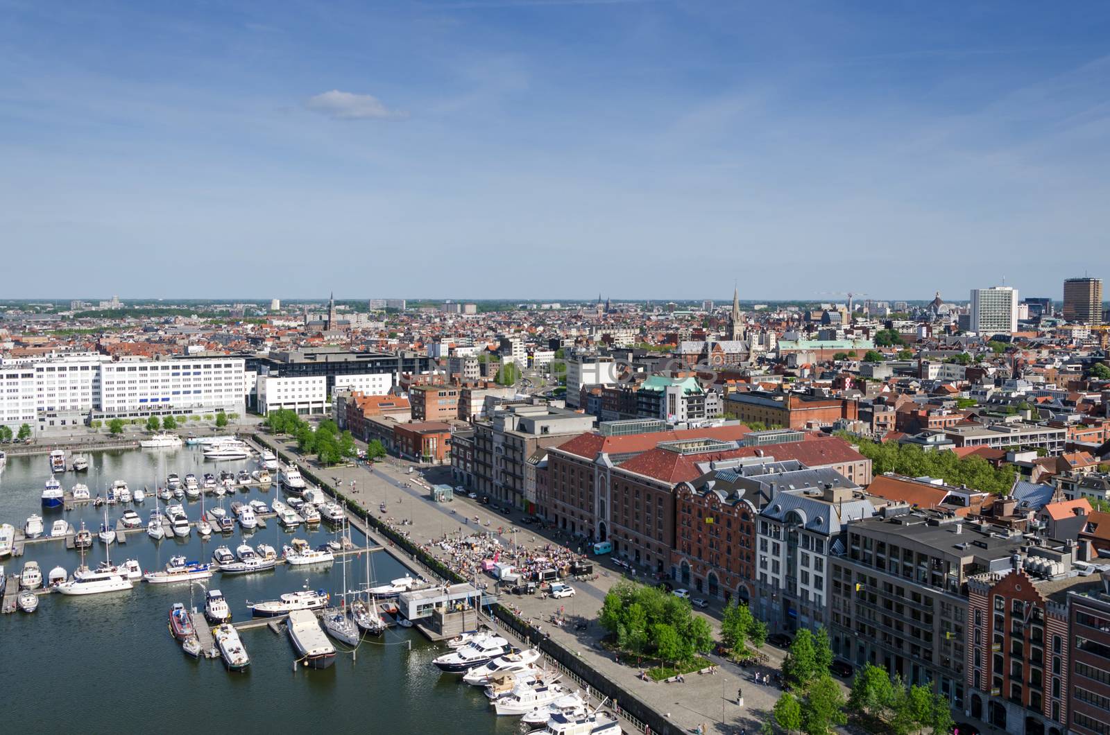 Yachts moored in the Willem Dock and Antwerp City, Belgium.