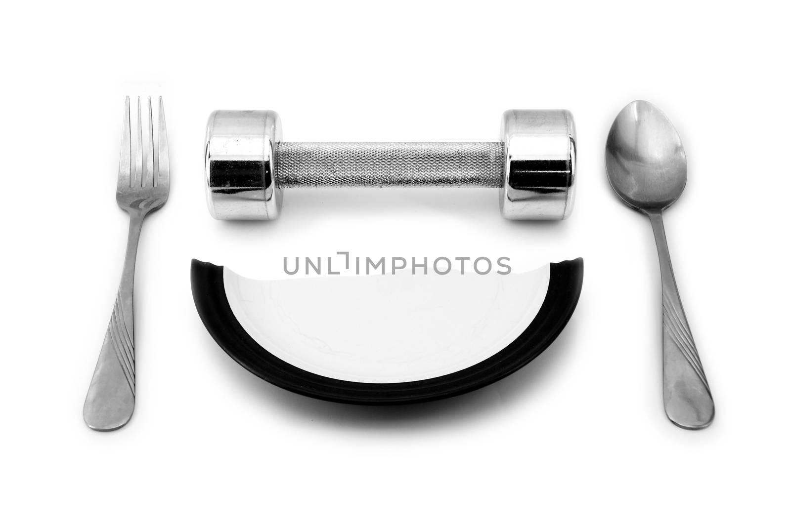 Dumbbell and a broken plate to serve for breakfast by mranucha