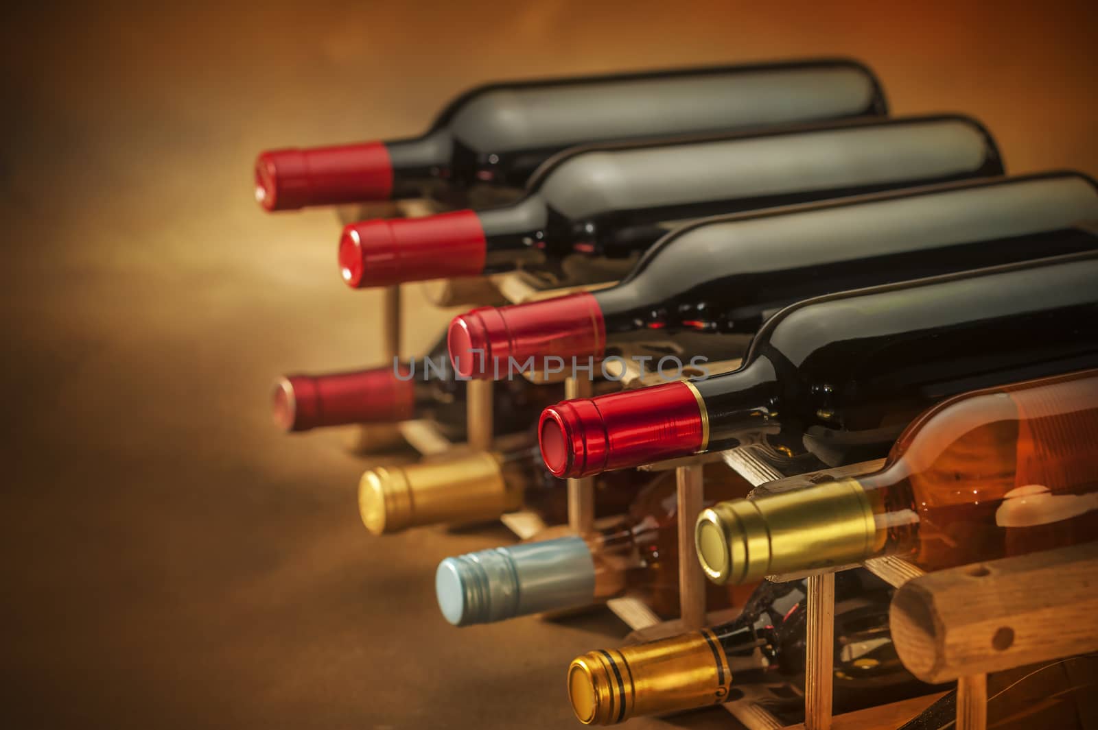 Wine bottles on rack by f/2sumicron