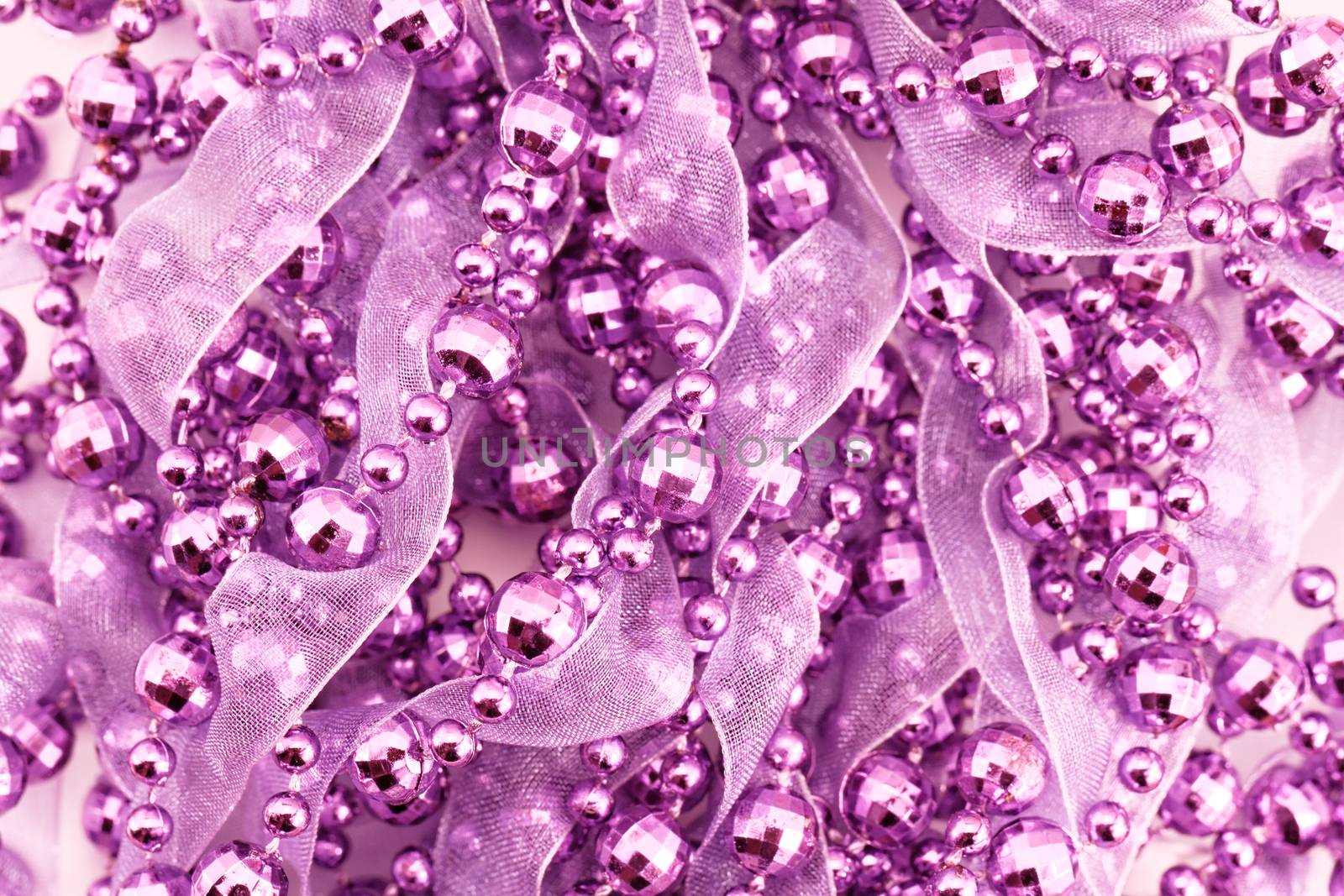 Close up of purple garland. Whole background.