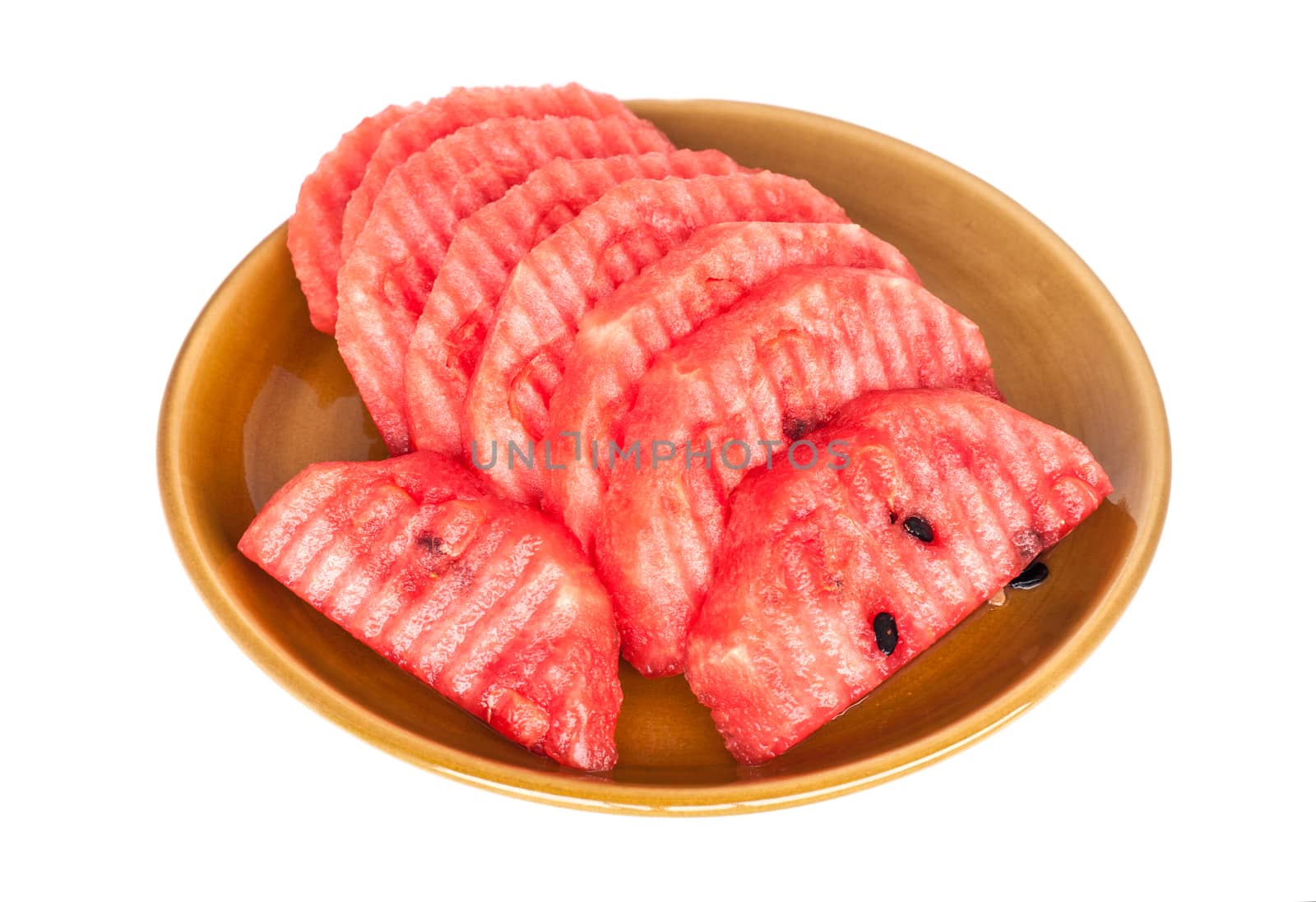 Watermelon slice in dish isolated on white background