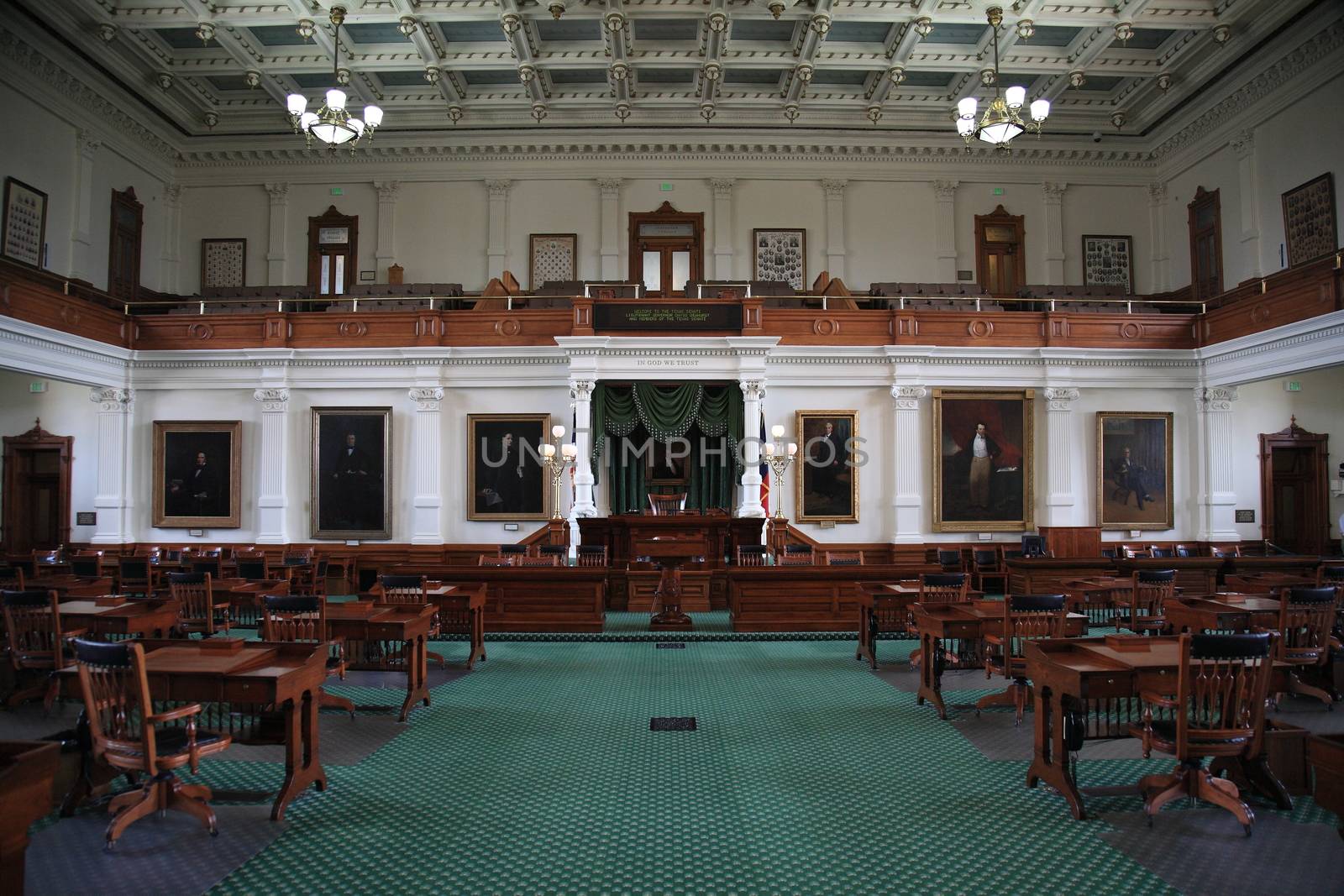 Desks and chairs in the historic senate chamber located in the Texas capital building in Austin.