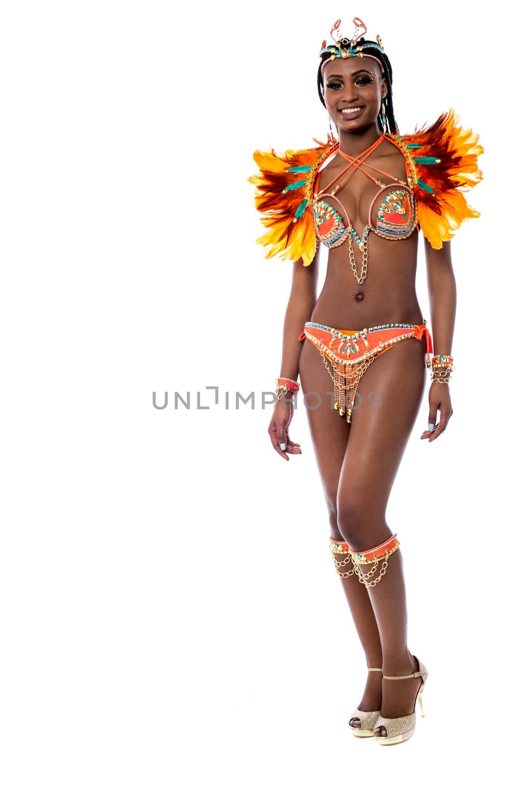 Cheerful samba dancer posing over white by stockyimages