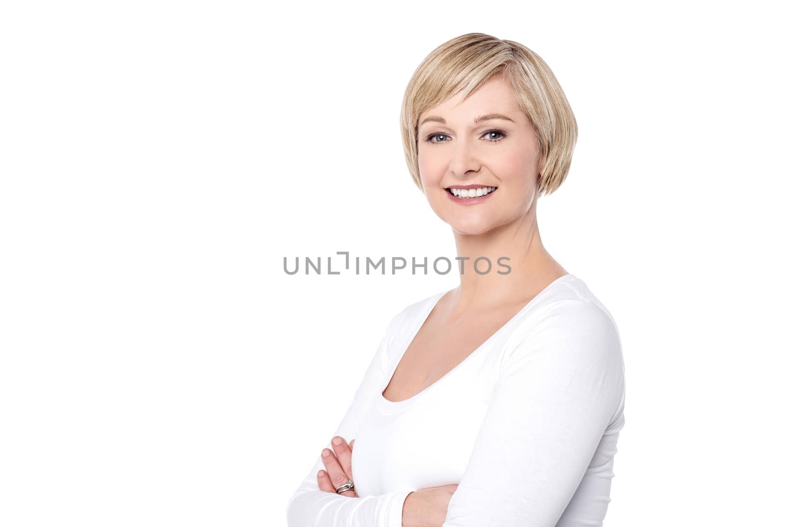 Smiling middle aged woman with folded arms