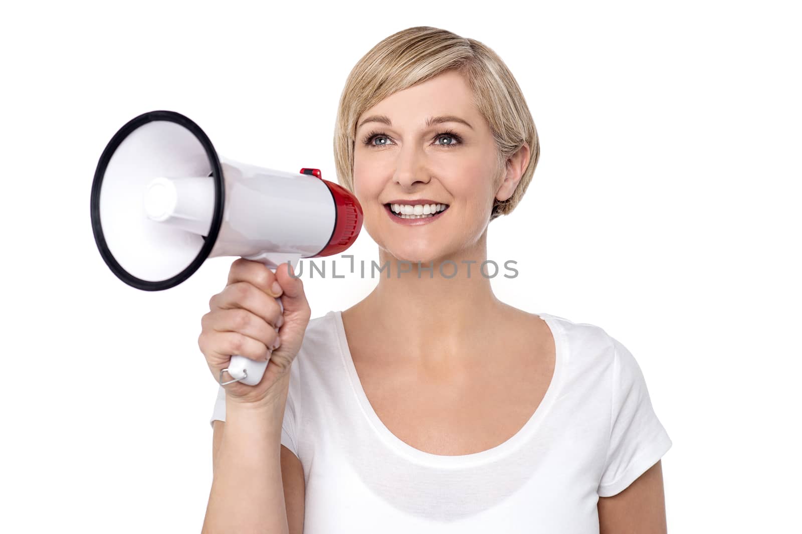 Beautiful woman proclaiming into megaphone