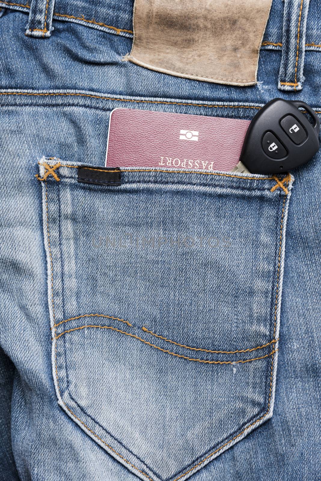 passport in jean pocket with car key