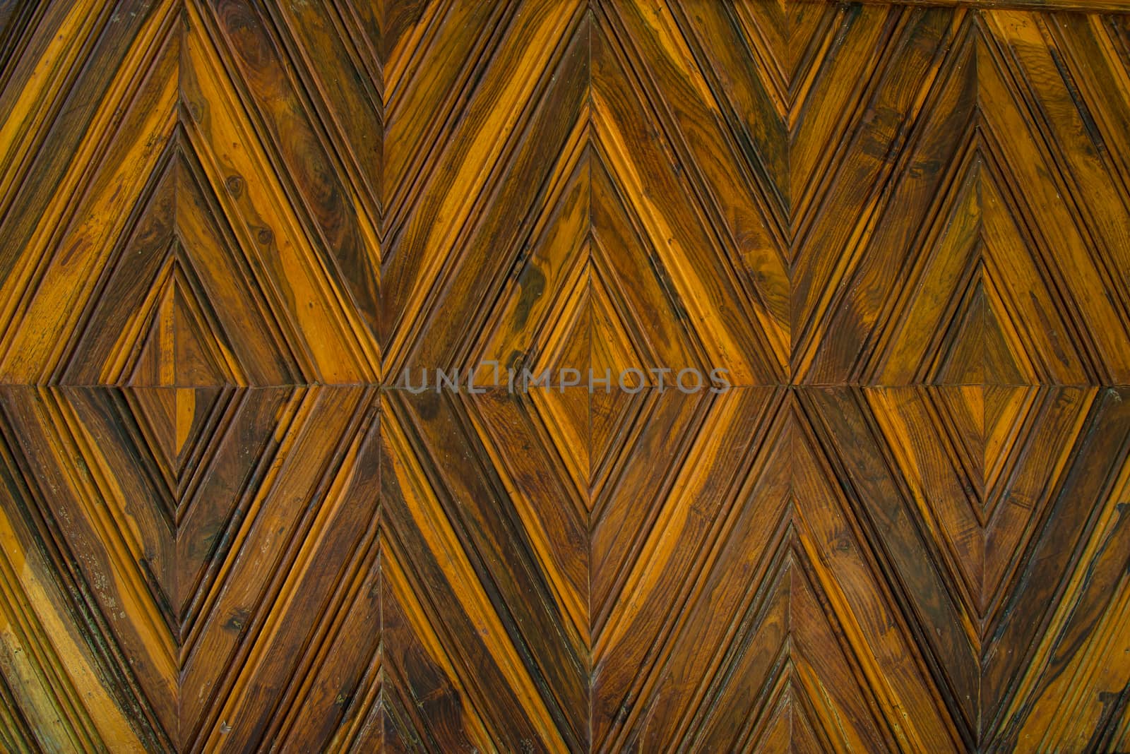 Pattern squares on a wooden wall, Background.